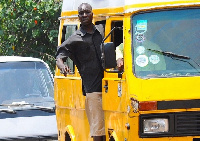 File photo: A bus conductor in his Bus