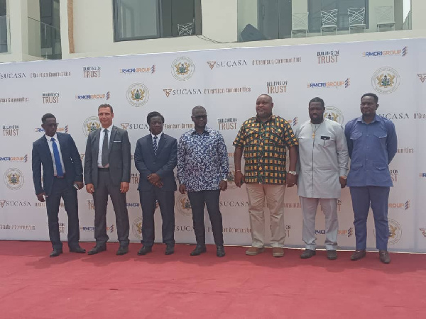 Minister Works and Housing (middle) with dignitaries during the launch