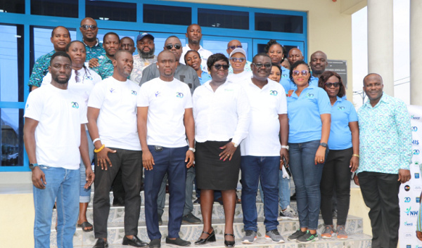 Dr. Yaa-Pokuaa in a pose with Greater Accra Regional NHIA staff