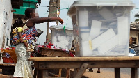 A woman casting her vote during an election