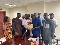 Emmanuel Armah Kofi Buah with some members of Alliance for Nzema Development