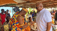 John Mahama exchanges pleasanteries with a chief in Assin North | File photo