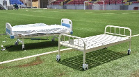 Beds are both on the pitch and in the buildings of the Onikan stadium