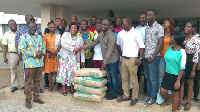 Friends of Baafi donating bags of cement Koforidua Technical University