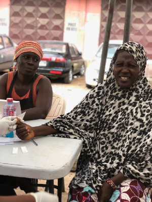 A woman having her turn of test