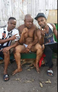 Bukom Banku (middle)