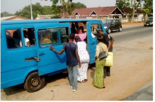 Passengers getting on a bus