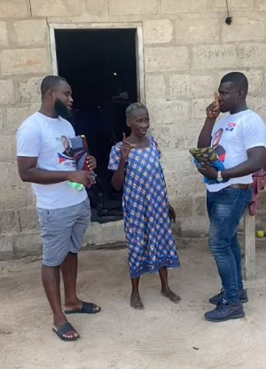 A delegate with two members of the  NPP