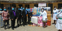 Representatives of Evangelical Presbyterian Church presenting the items to the hospital staff