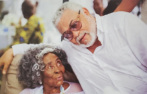 Former President Rawlings in a tete-a-tete with his mother Victoria Agbotui