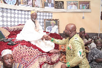 Mr. Michael Okyere Baafi shakes hands with the Overlord of Dagbon, Ya-Na Abubakari Mahama