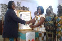 Ms Victoria Adjei (R), the overall best permanent revenue collector