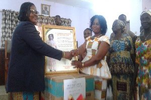 Ms Victoria Adjei (R), the overall best permanent revenue collector