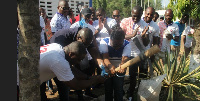 Fred Darko, President of the 93-year group and Rev. Dr. Markwei cut sod for the E-Library