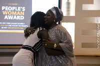 The women's commissioner, Edna Agnes Boakye hugging Gifty Anti