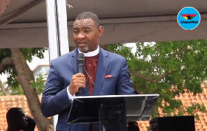 Dr. Lawrence Tetteh on stage at Ebony's burial service