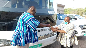 Upper West Regional Minister Dr Bin Salih  Making A Presentation Of One Of The Buses