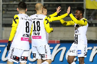 Samuel Tetteh joins his mates to celebrate a goal