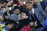 Kevin-Prince Boateng joins some fans for a selfie