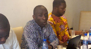 Communications Director of Ghana National Gas Company, Ernest Owusu-Bempah [Middle]