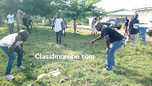 Some members of the NDC taking part in the weeding exercise