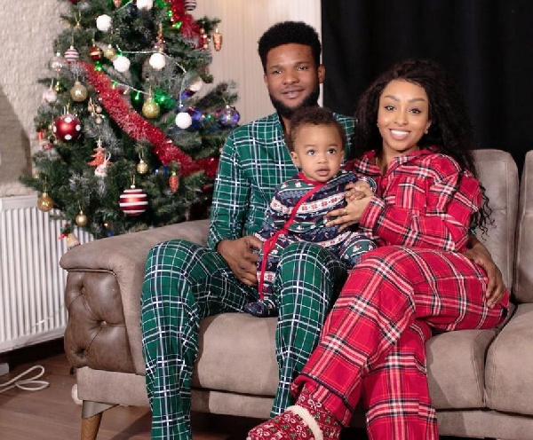 Benjamin Tetteh with his wife and son