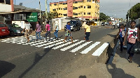 The team marked zebra crossings across the streets at Holy Family Parish in Mateheko