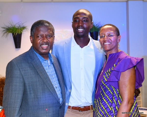 Dr. Ed Christian Awah in a pose with his parents