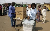 Voters queue at polling station