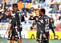 Ibrahim Mustapha (right) congratulated by teammates