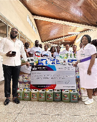 Prophet Eric Boahen, officials of the hospital facility during the presentation of the items