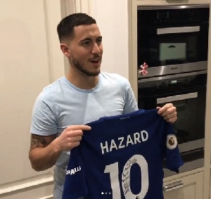 Chelsea star Eden Hazard with the singed jersey