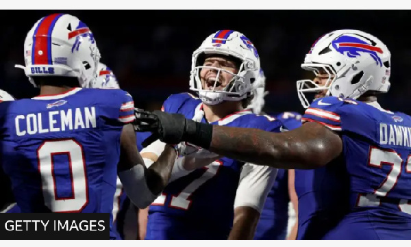 Josh Allen (centre) was seventh overall pick for the Buffalo Bills in the 2018 NFL draft