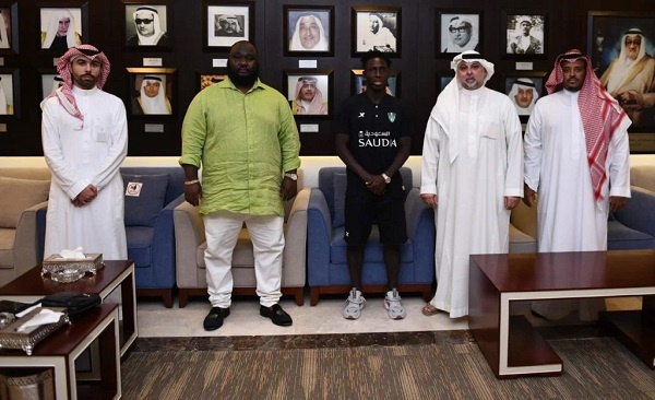 Samuel Owusu and his manager Bogdan Osekre with officials of Al Ahli Jeddah