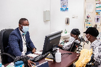 Dr. Okoe Boye in the consulting room