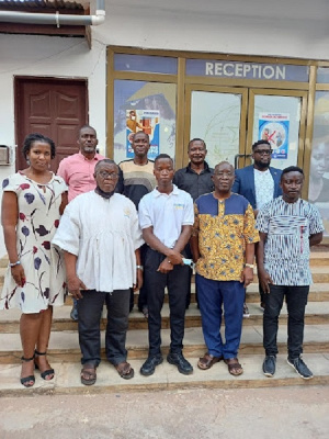 Samuel Aboagye(middle), with Dr Paul Fynn, Professor Obeng Mireku, Mr Sam Hagan, and some management