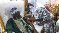 Chief Imam, Sheikh Osmanu Nuhu Sharubutu receiving vaccine