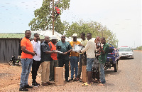 MP for Navrongo Central, Sampson Tangombu Chiragia poses with some residents