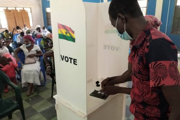 A participants given practical applications of the tactile jacket for the December 7 election