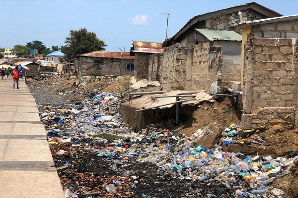 A portion of the bridge has been turned into a refuse dump by some residents