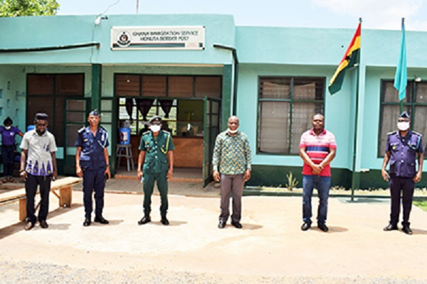 Mr Apau (second right) and Monsieur Assan (third right) with some security agency representatives