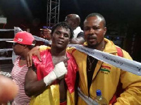 Patrick Ayi with cornerman