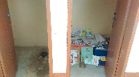 The distressed school uses a latrine pit as an office