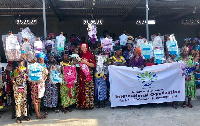 Hajia Salma Mohammed Adam Kuta presenting some items for Ramadan