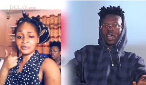 Strongman Burner with girlfriend Nana Ama