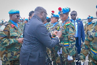 Mahamudu Bawumia decorating a member of the UN Peacekeeping force from Ghana