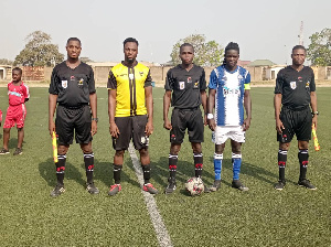 Match officials with captains from both teams