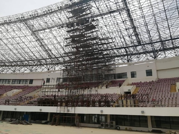 A section of the stadium with abandoned metal scaffolds