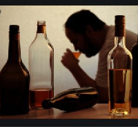 A file photo of a man drinking