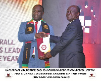 Mr Eric Asubongteng recieving his award at the Ghana Business Standard Awards